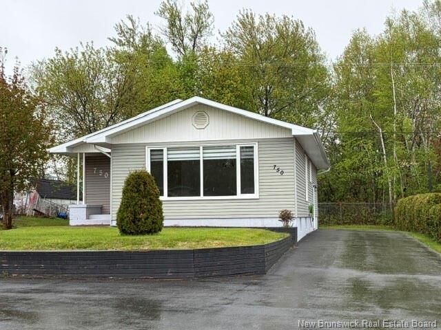 Property Photo:  750 Parkwood Street  NB E2A 4C3 