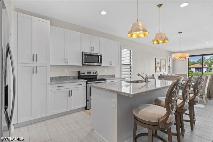 Property Photo:  8968 Madrid Circle  FL 34104 