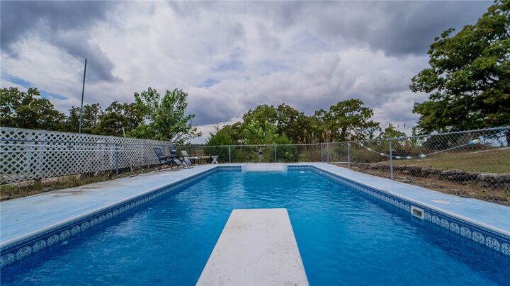 Property Photo:  1483 Madison 7855  AR 72740 