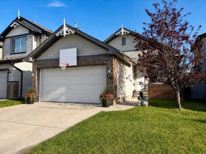 Property Photo: 129 Cimarron Grove Circle AB T1S 2M1