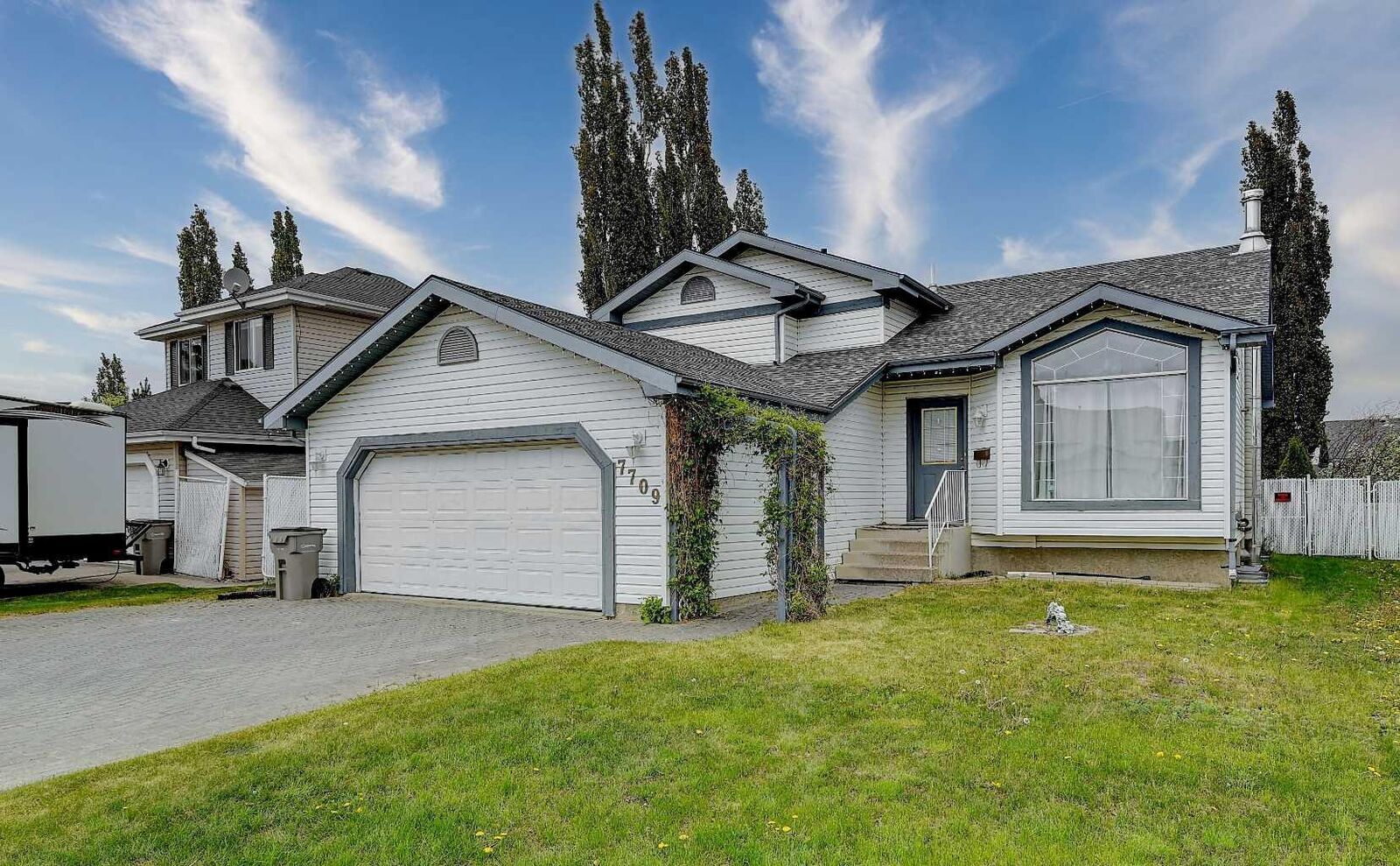 Property Photo: 7709 106A Street AB T8W 2H8