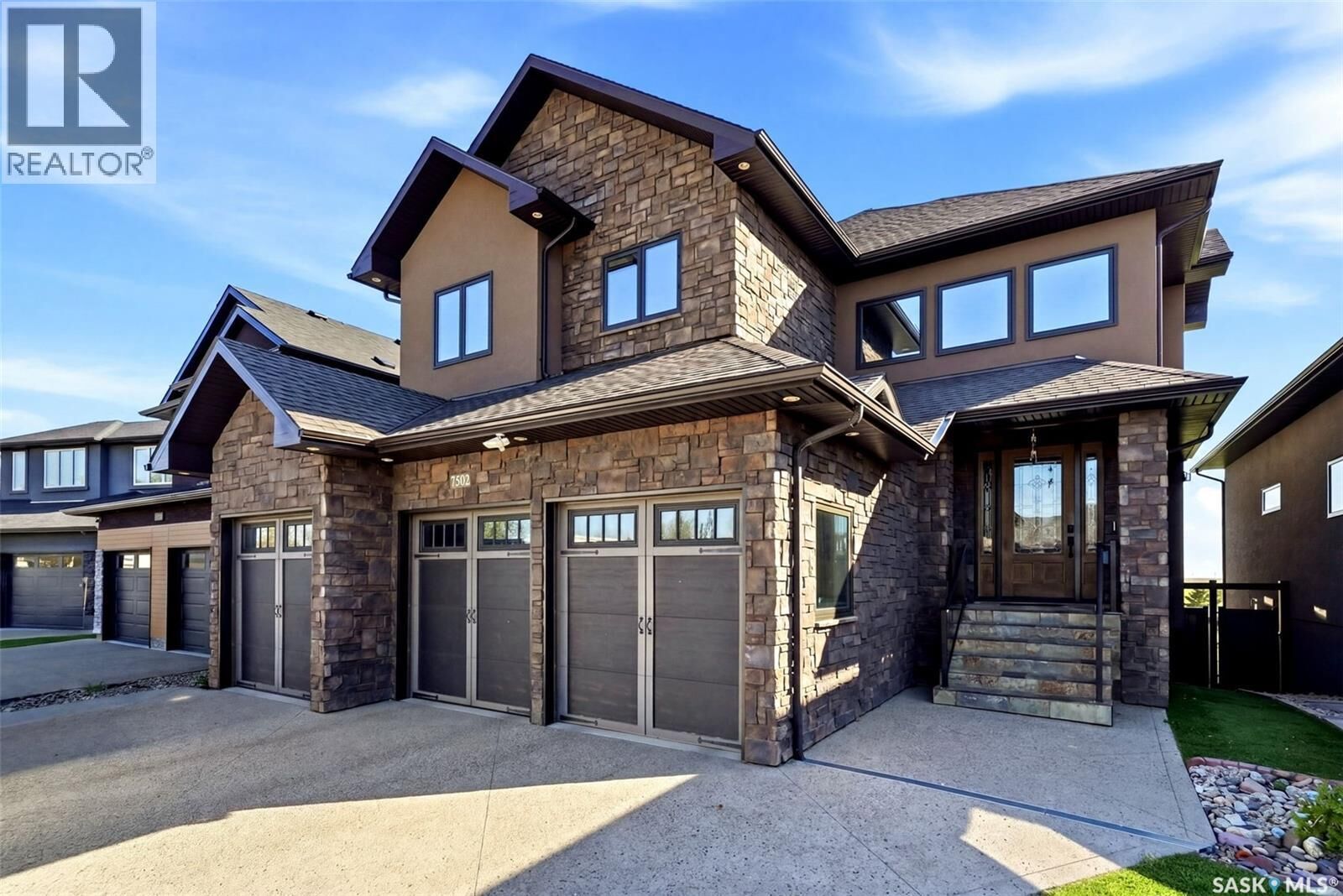 Property Photo: 7502 Lilac Place SK S4Y 0B3
