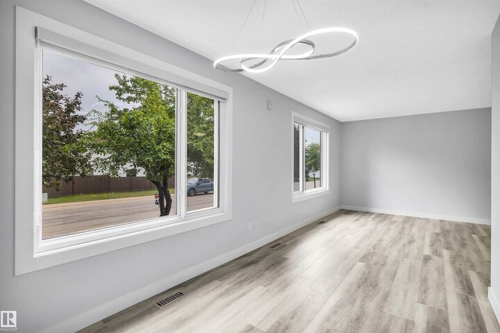 Property Photo: 14208 51 Street NW AB T5A 0A9