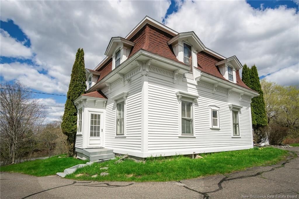 Property Photo:  697 Bay Street  NB E2M 7L6 