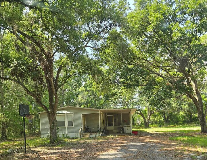 Property Photo:  38625 County Line Road  FL 33540 