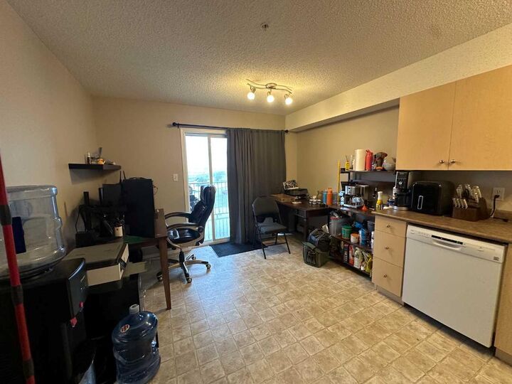 Property Photo: 204 17 Street E 306 AB T1R 1R1