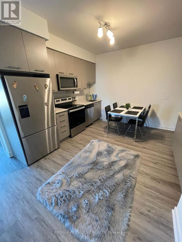 Property Photo:  385 Winston Road 205  ON L3M 4E8 