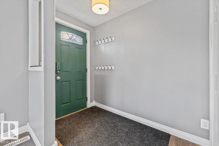 Property Photo:  11910 95 Street NW  AB T5G 1R5 