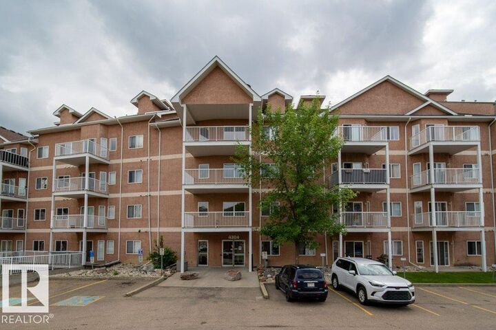 Property Photo: 4304 139 Avenue NW 303 AB T5Y 0H6