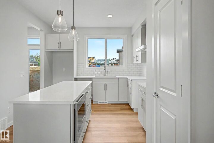 21120 25 Ave NW — photo 1