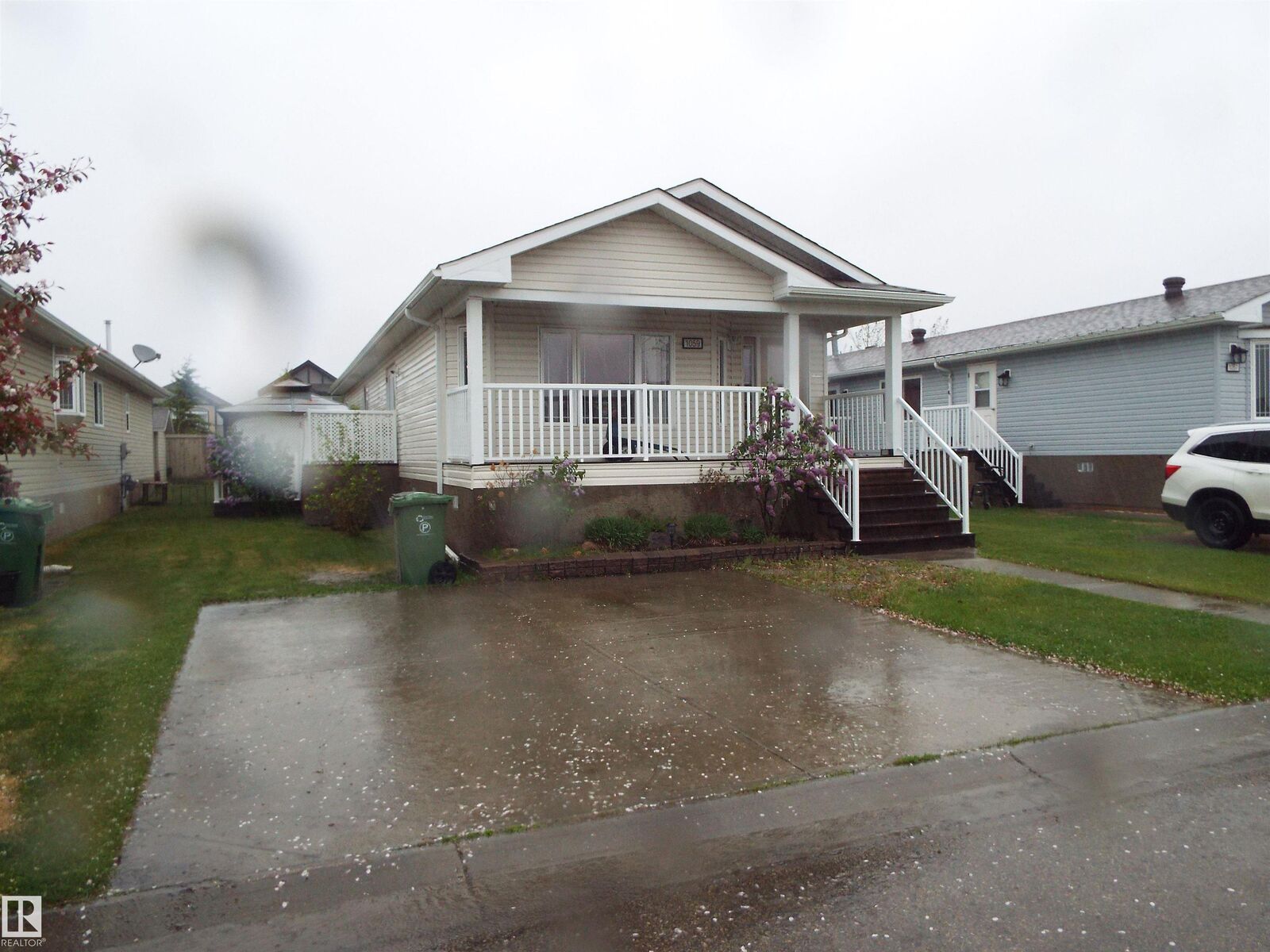 Property Photo:  1059 Aspen Drive East  AB T9E 8R1 