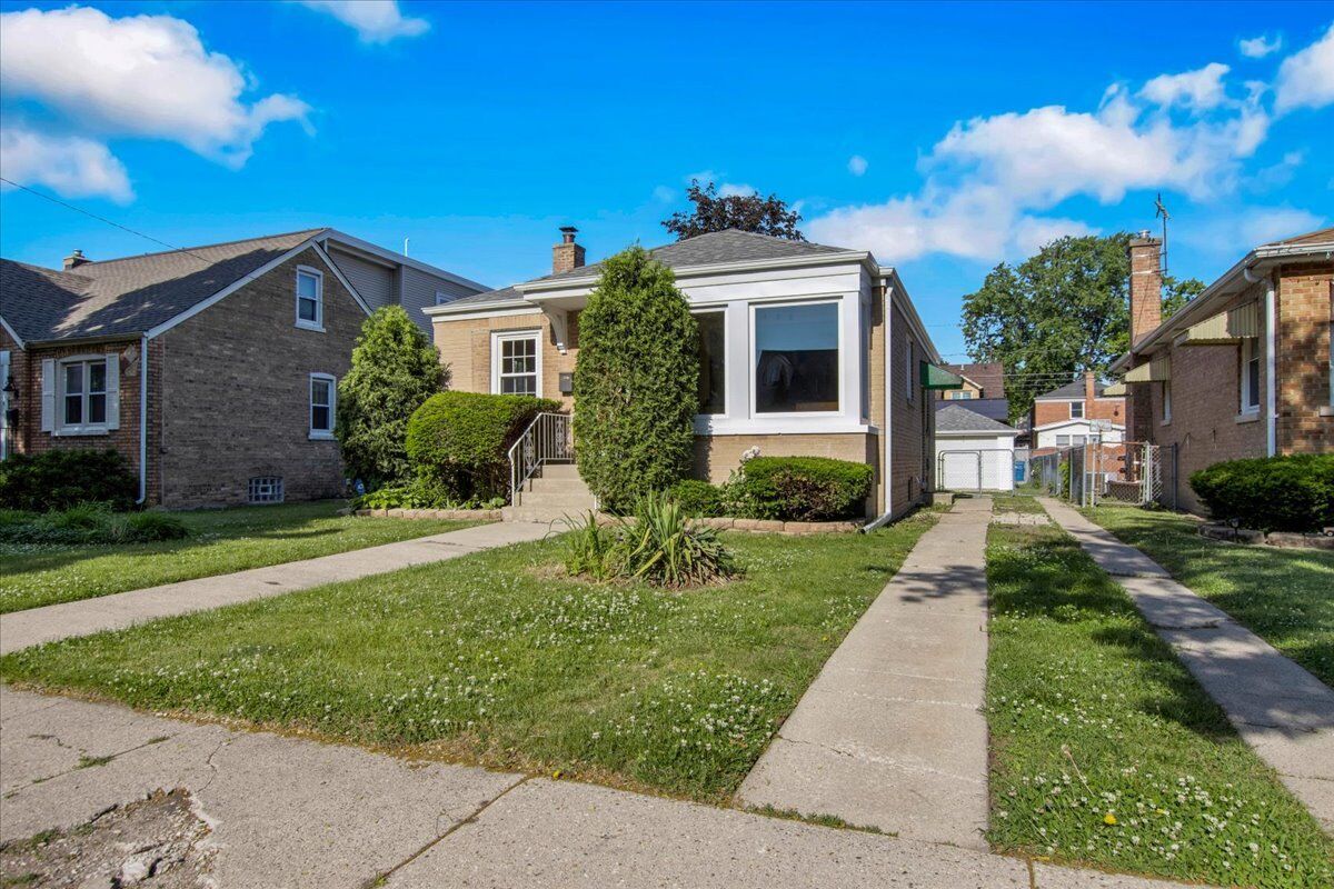 Property Photo: 3122 Emerson Street IL 60131