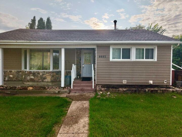 Property Photo: 8602 95 Street AB T8S 1G5