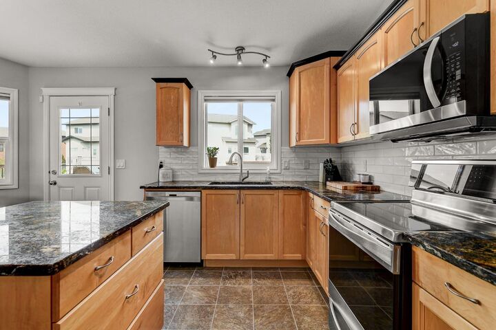 Property Photo: 7625 114 Street AB T8W 2T7