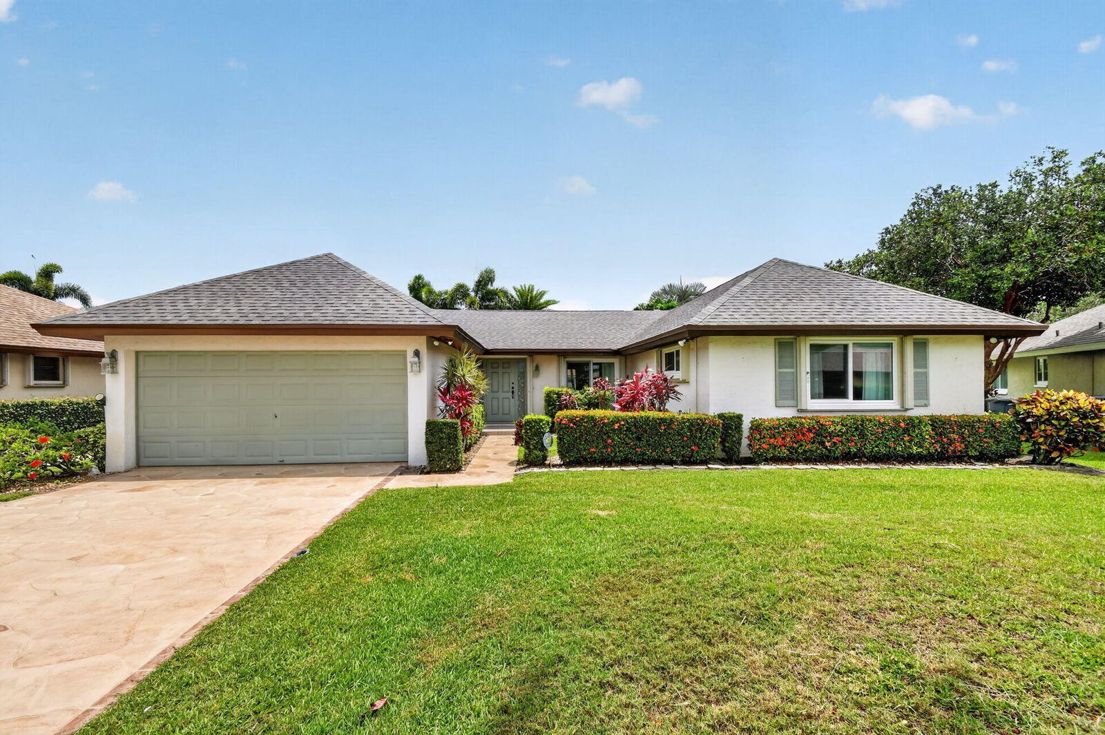 Property Photo:  10460 Greentrail Drive N  FL 33436 
