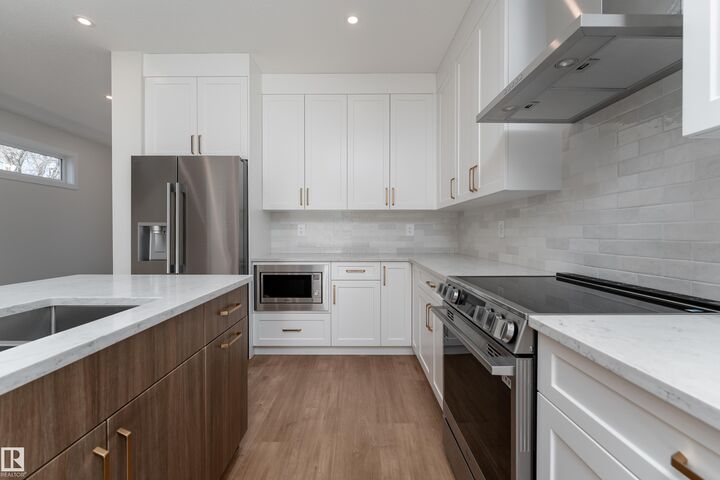 Property Photo:  13034 123A Street NW  AB T5L 0L2 