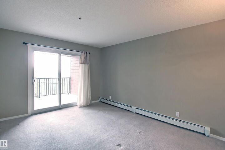 Property Photo:  1510 Watt Drive SW 215  AB T6X 2E6 