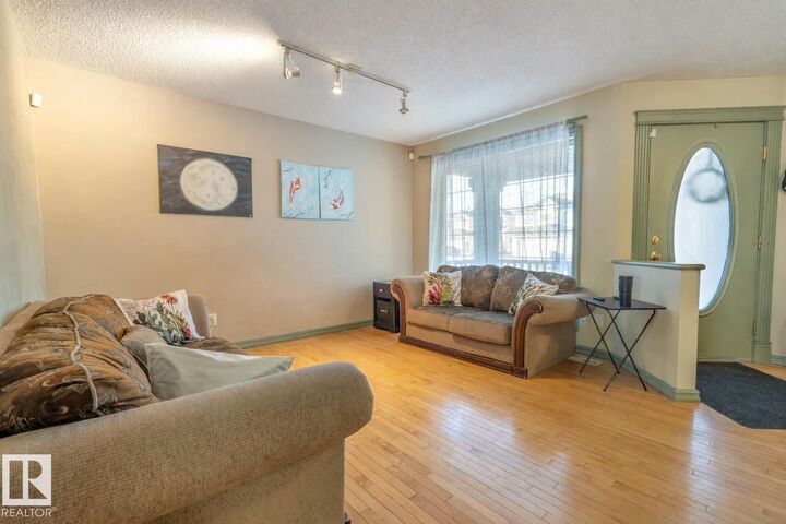 Property Photo: 11813 12 Avenue NW AB T6J 7E4