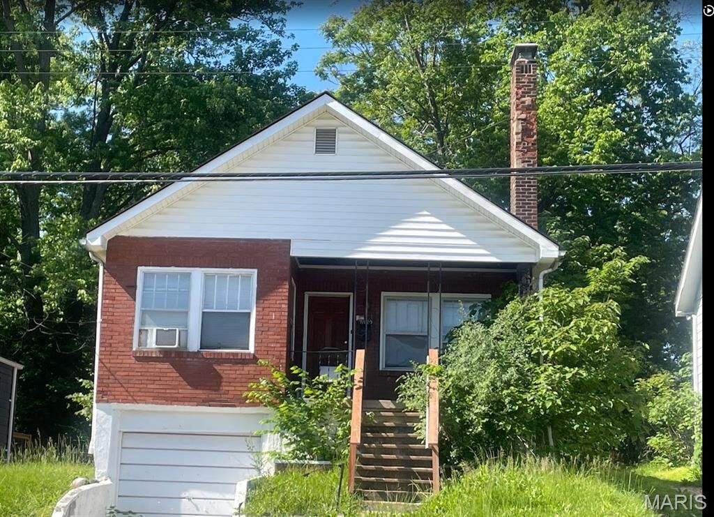 Property Photo:  7032 Emma Avenue  MO 63136 