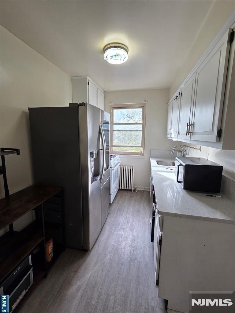 Property Photo:  125 E Clinton Avenue 3B  NJ 07621 
