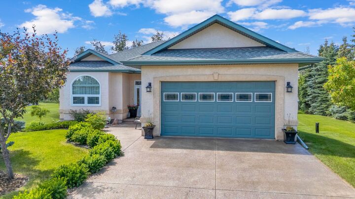Property Photo: 9 Creek Road AB T4J 1R3