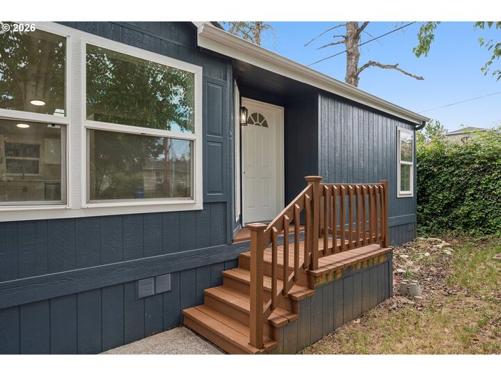Property Photo:  12420 SE Bush St 1  OR 97236 