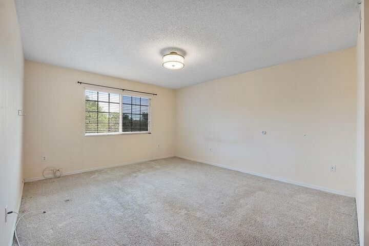 Property Photo:  5011 Wiles Road 303  FL 33073 