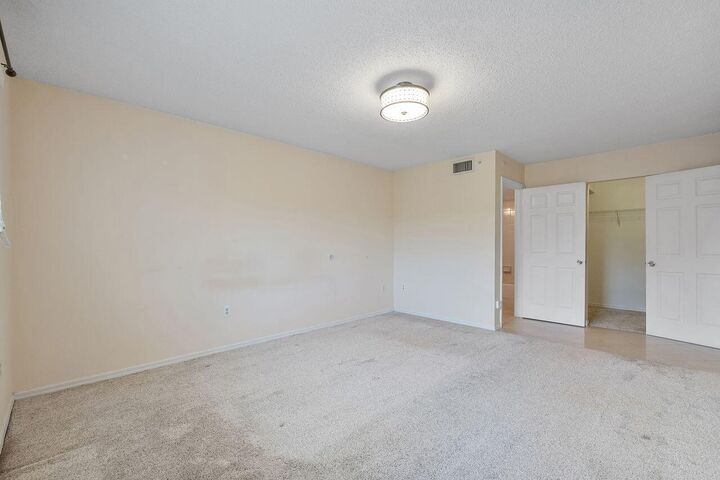 Property Photo:  5011 Wiles Road 303  FL 33073 