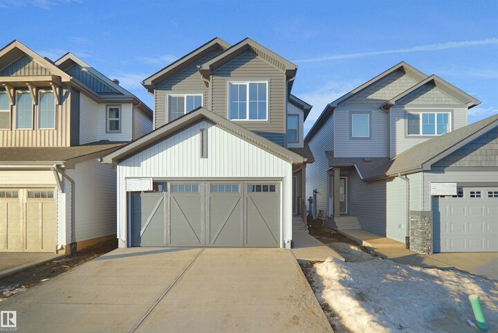 Property Photo:  20940 16 Avenue NW  AB T6M 1P7 