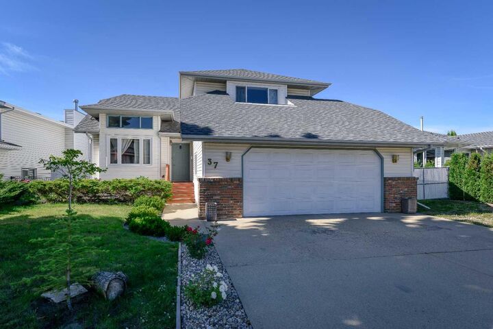 Property Photo: 37 Denovan Crescent AB T4R 2B6