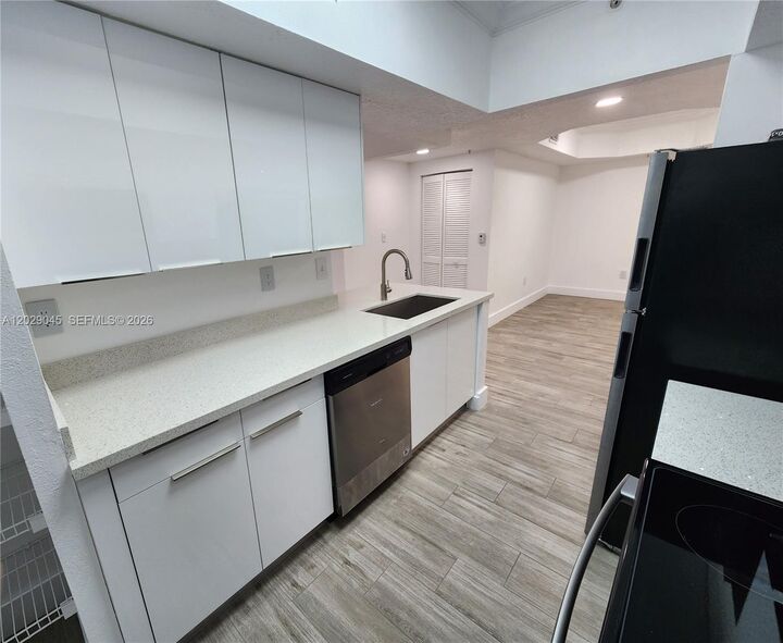 Property Photo:  215 SW 117th Ter 14101  FL 33025 