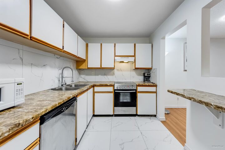 Property Photo: 13364 102 Avenue 108 BC V3T 5L8