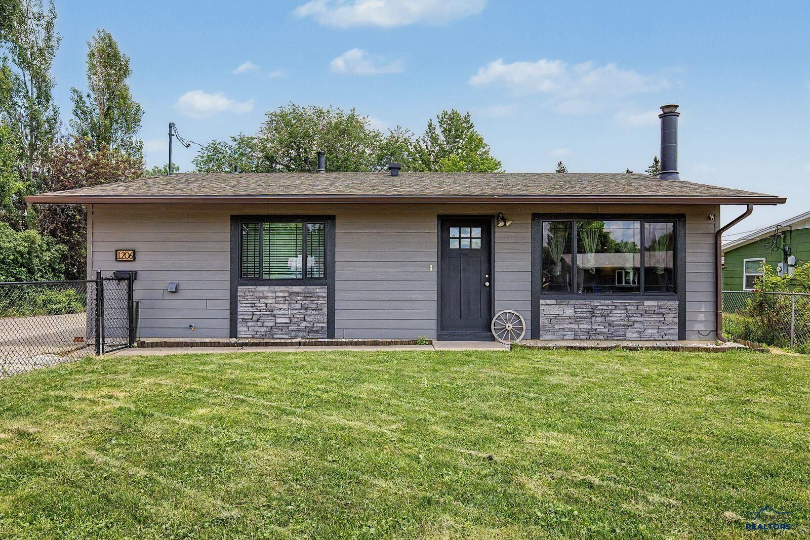 Property Photo: 1206 Woodlawn Dr SD 57701