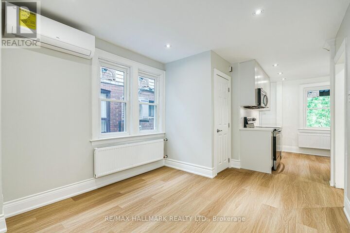 Property Photo:  229 Kingston Road  ON M4L 1T5 