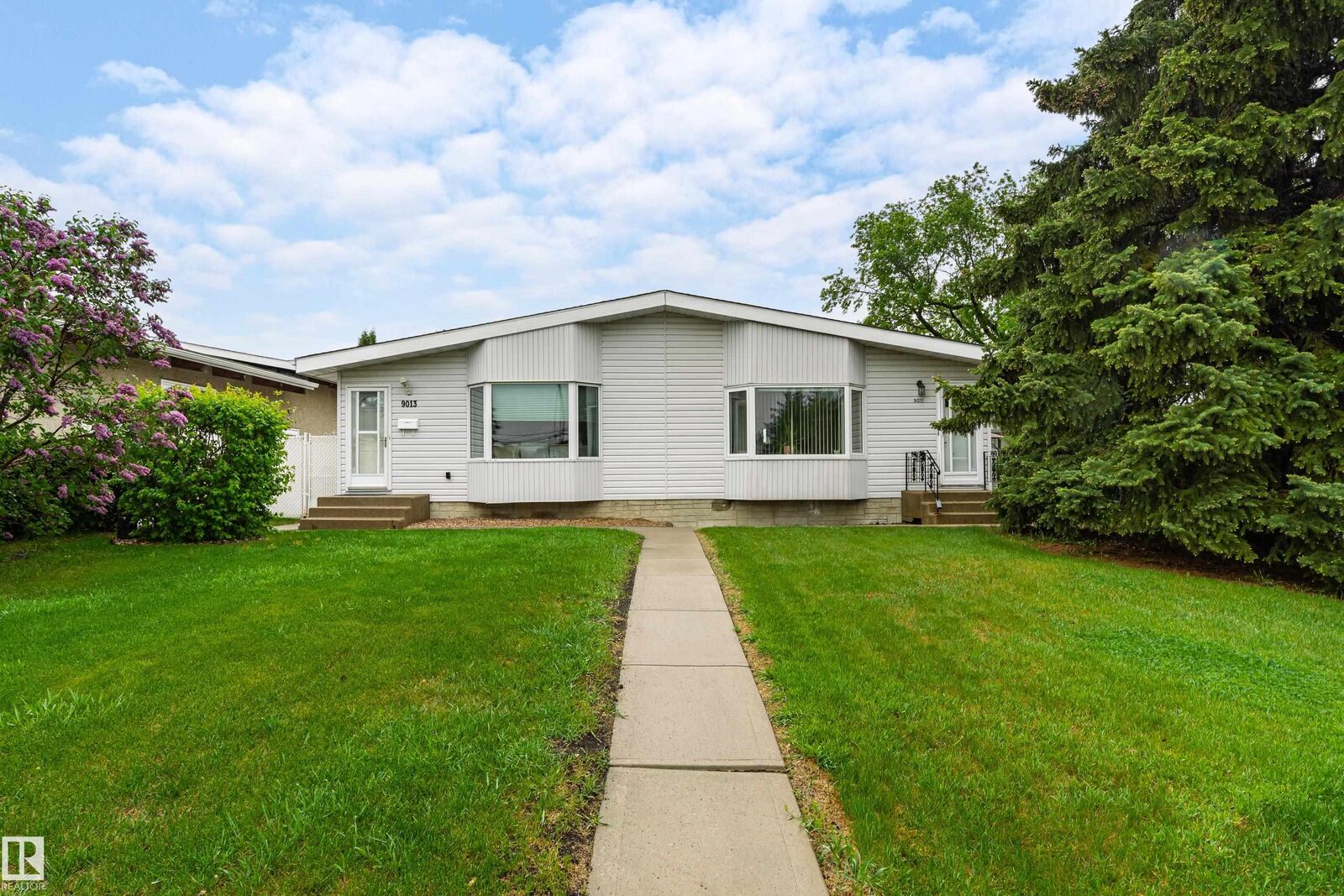 Property Photo:  9011 60 Street NW  AB T6B 1M7 