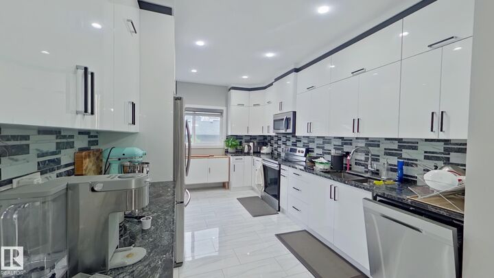 Property Photo:  8543 80 Avenue NW  AB T6C 0T2 