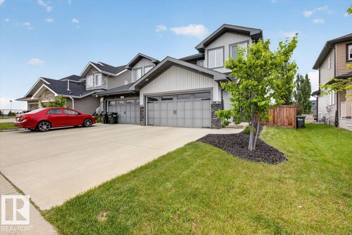 Property Photo:  148 Amberley Way  AB T8H 0X2 