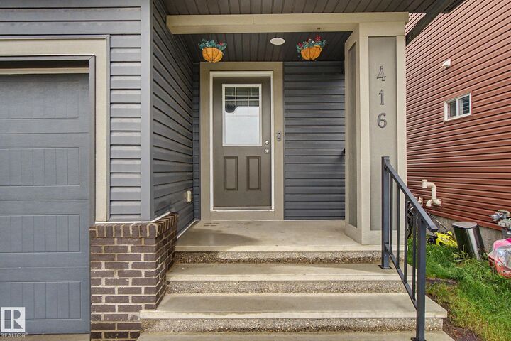 Property Photo:  416 Crystallina Nera Drive NW  AB T5Z 0P3 