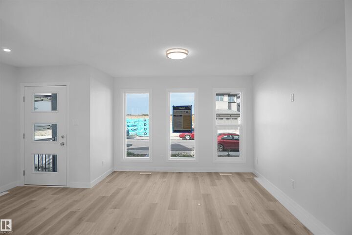 Property Photo:  18976 28 Avenue NW  AB T5Y 4G2 