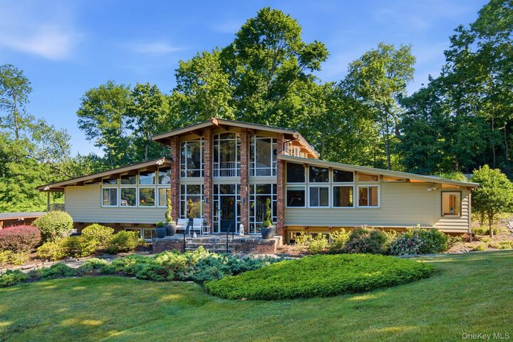 Property Photo:  2 Fiddlers Green Drive  NY 11743 