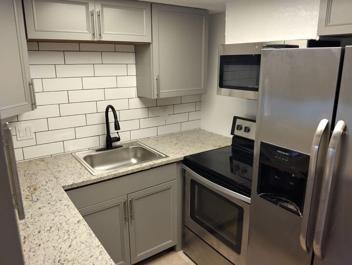 Property Photo:  199 Fulton Street NE 4  FL 33771 