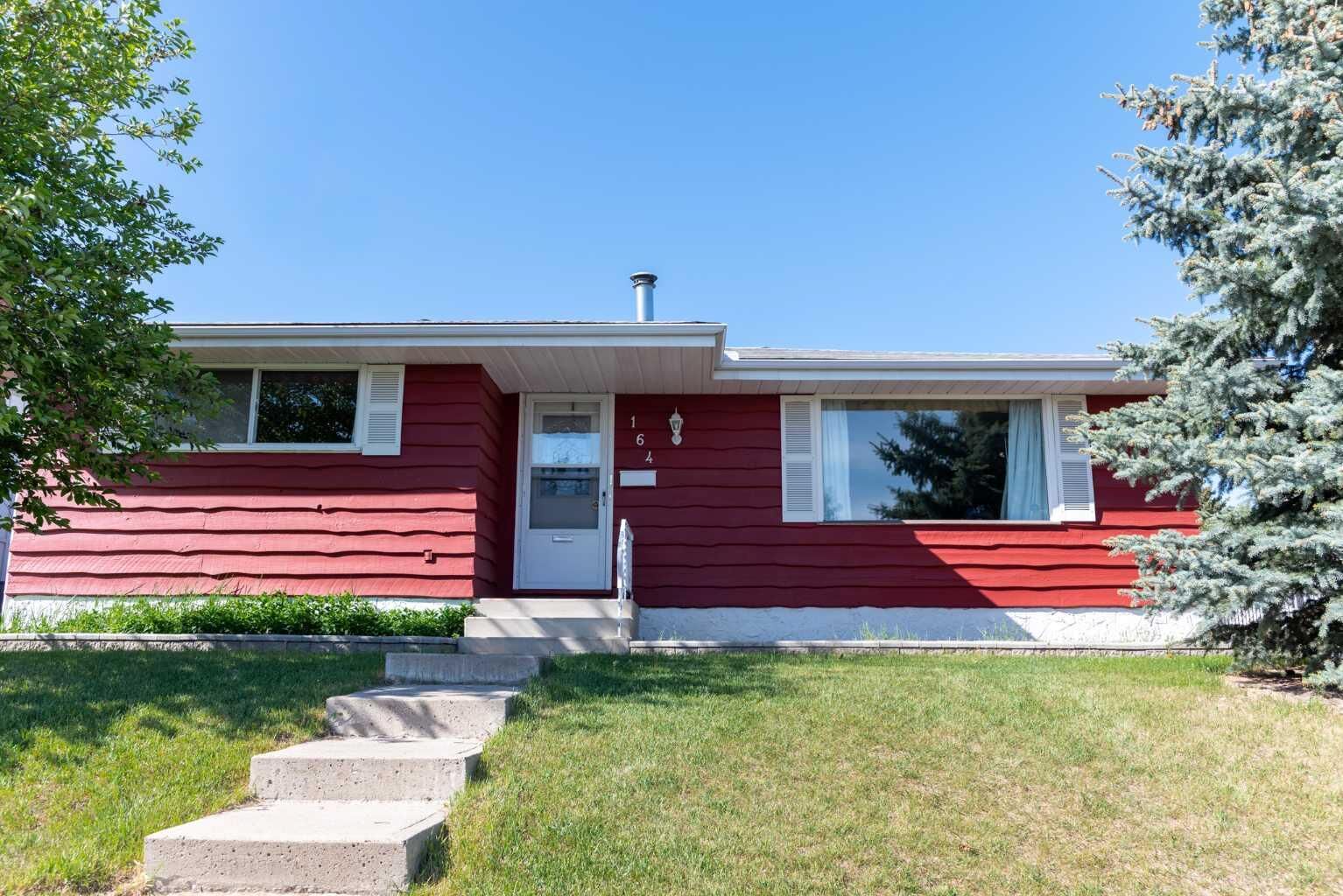 Property Photo:  164 Huntford Road NE  AB T2K 3Y9 
