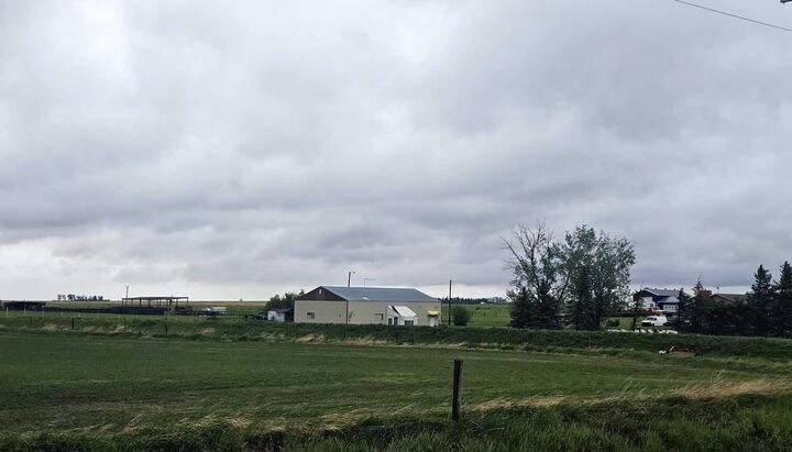 Property Photo:  270182 Inverlake Road  AB T1X 2E3 