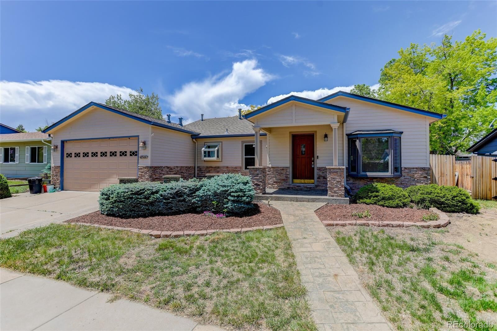 Property Photo:  4749 S Xenophon Street  CO 80465 