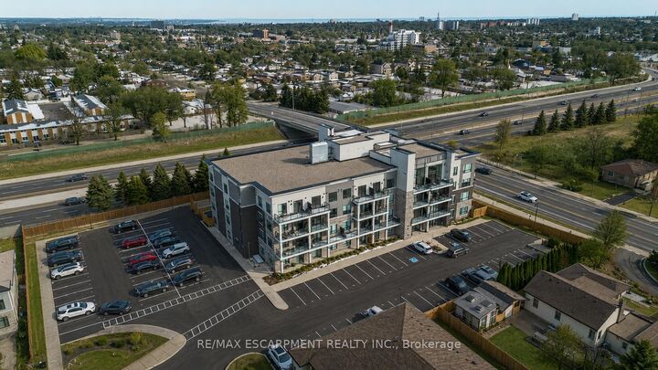 120 Springvalley Crescent 104 — photo 1