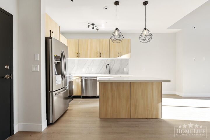 Property Photo:  14858 60 Avenue 304  BC V3S 0B5 