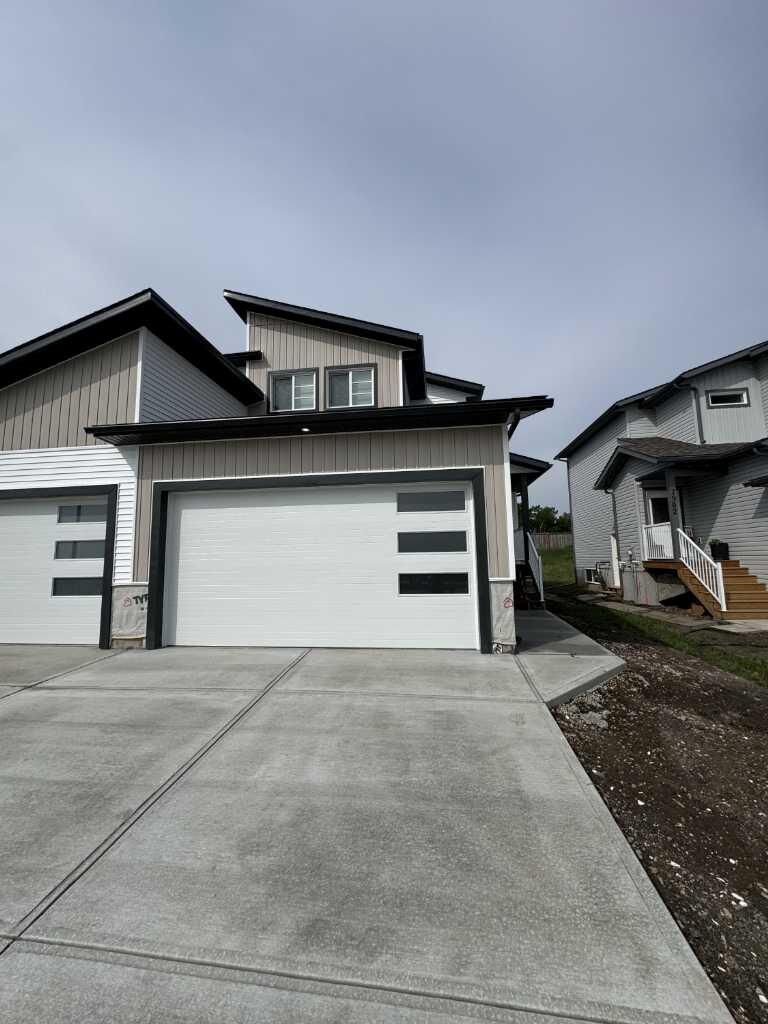 Property Photo:  7822 91 Street  AB T8X 0W3 