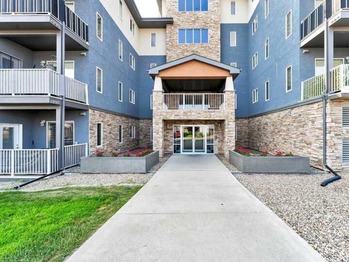 Property Photo: 19 Terrace View NE 305 AB T1C 0E8