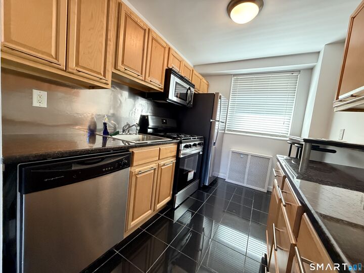 Property Photo: 91 Strawberry Hill Avenue 425 CT 06902