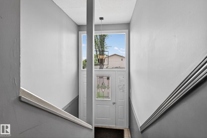 Property Photo: 6203 122 Avenue NW AB T5W 1S7
